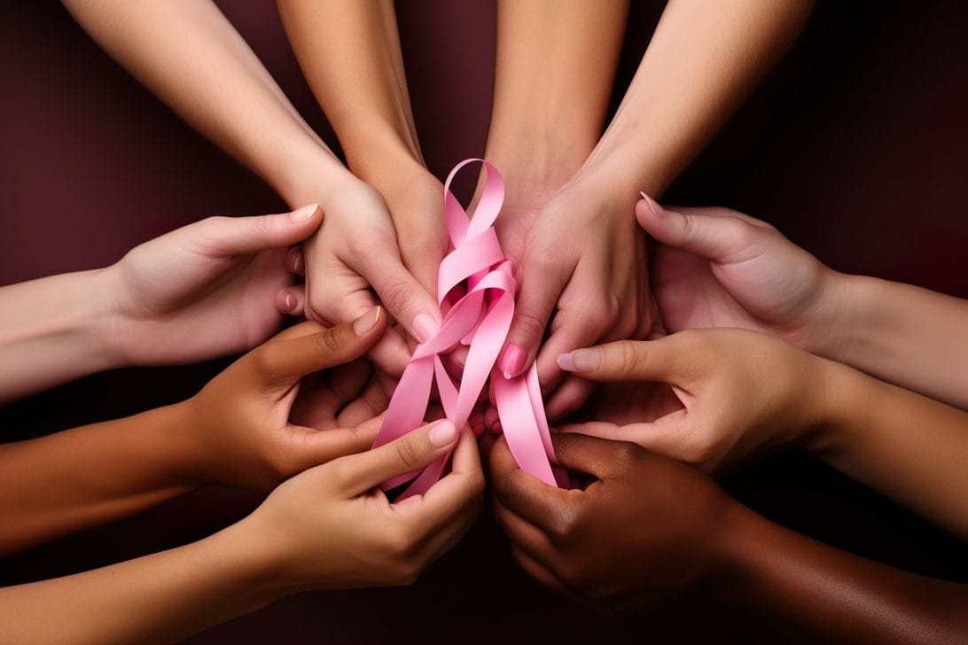 women fighting breast cancer Several hands bringing together a pink health ribbon - Sonajero.es